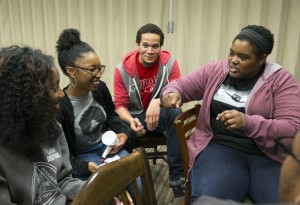 Google software engineer and Google In Residence Sabrina Williams, right, talks with students including, from left, freshmen Lucretia Williams, Alanna Walton, and Christopher Hocutt, during a Google Student Development class on Impostor Syndrome at Howard University in Washington, Tuesday, April 14, 2015. In ongoing efforts to diversify Silicon Valley’s tech sector, Google is embedding engineers at a handful of Historically Black Colleges and Universities where they teach, mentor and advise on curriculum. (AP Photo/Molly Riley)